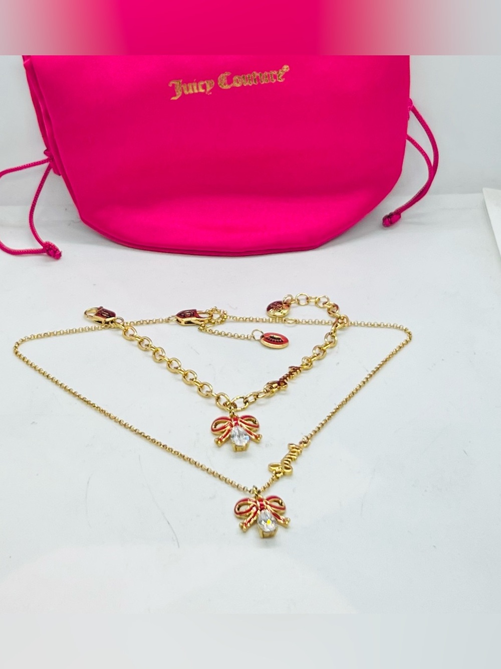 Juicy Couture Gold Tone Bow Pendant Necklace Set with Hot Pink Accents